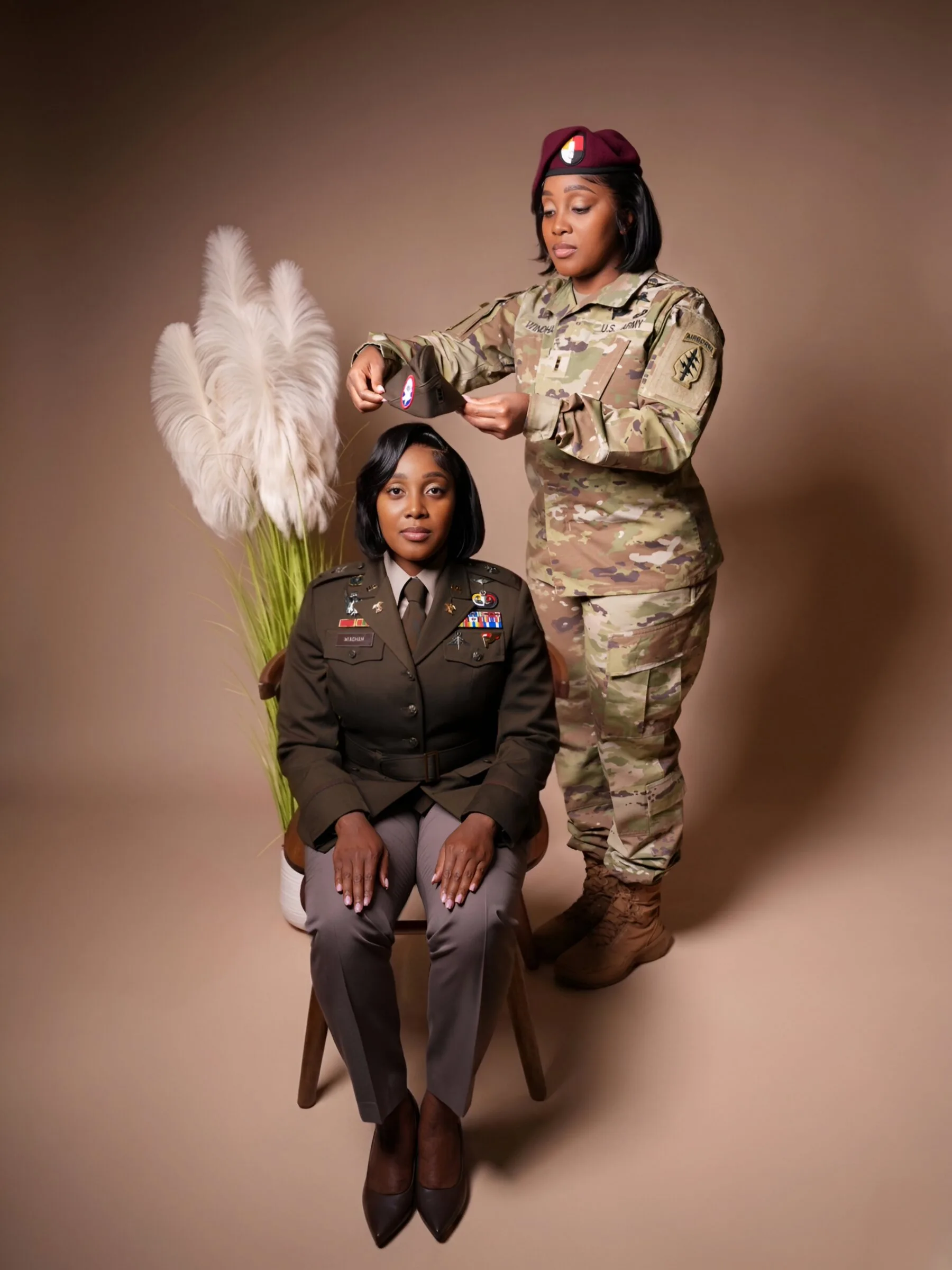 Portrait of two service members in dress and field uniforms
