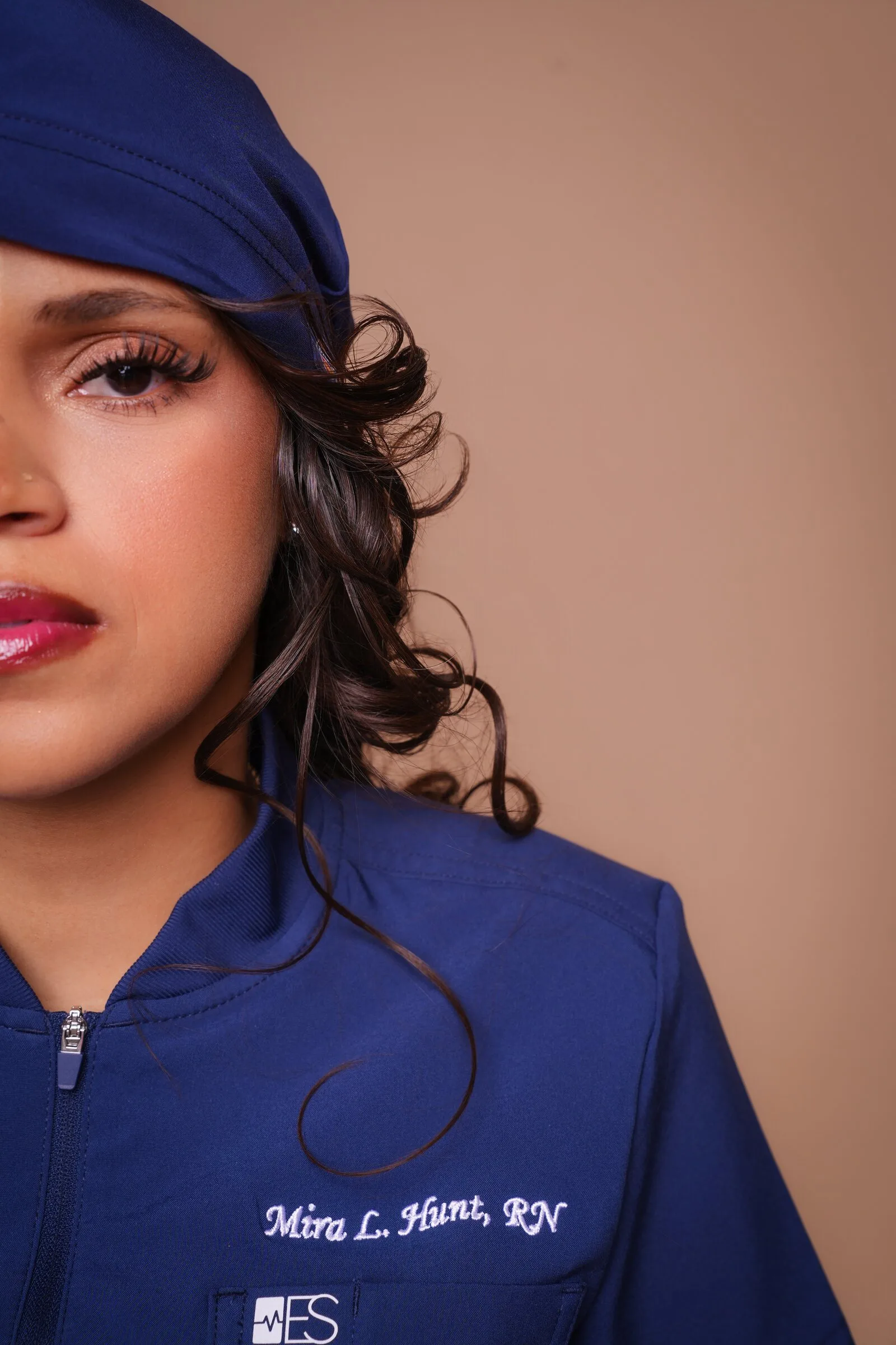 Beauty portrait of a registered nurse in navy scrubs