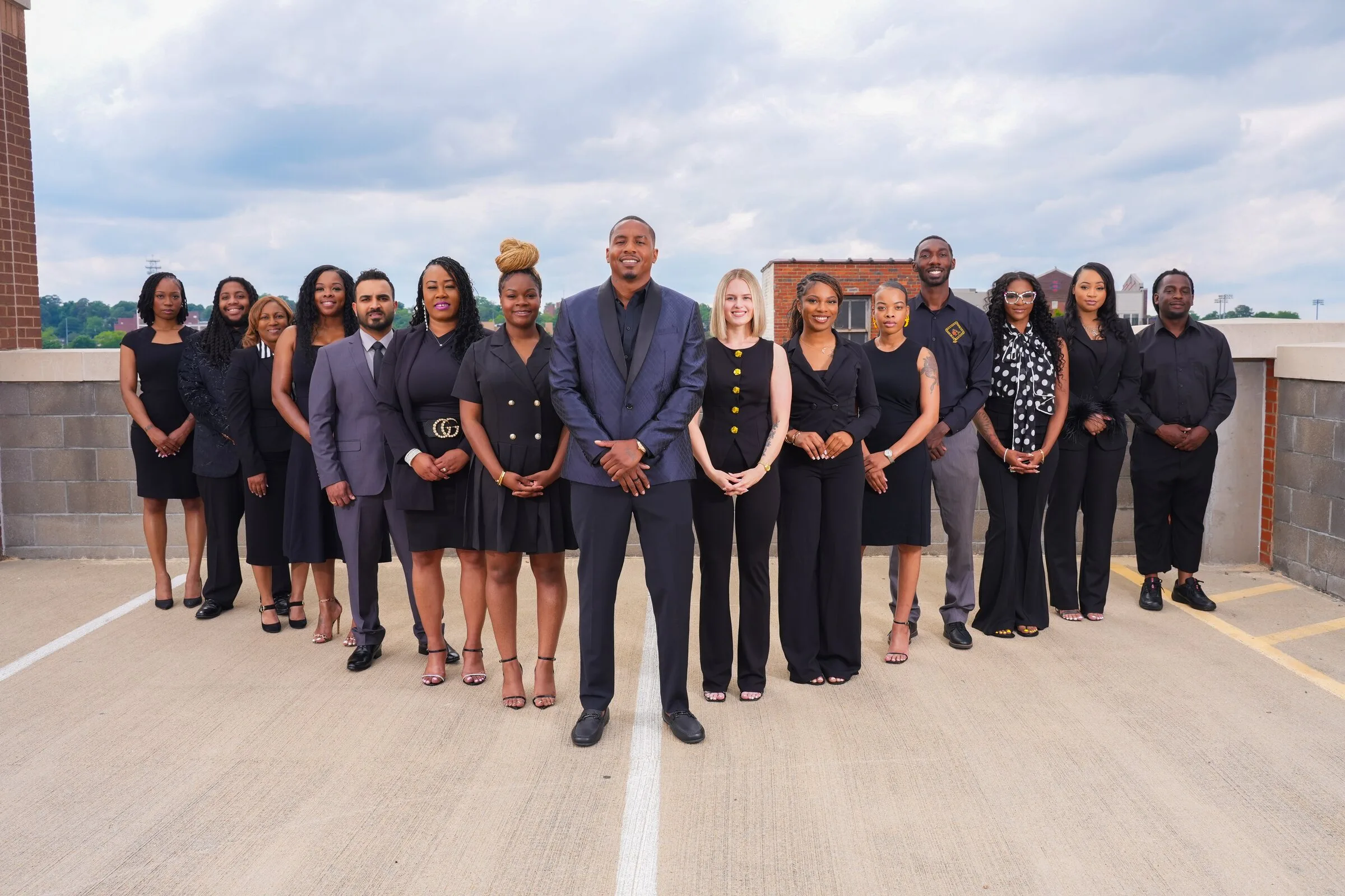 Professional team portrait photographed outdoors